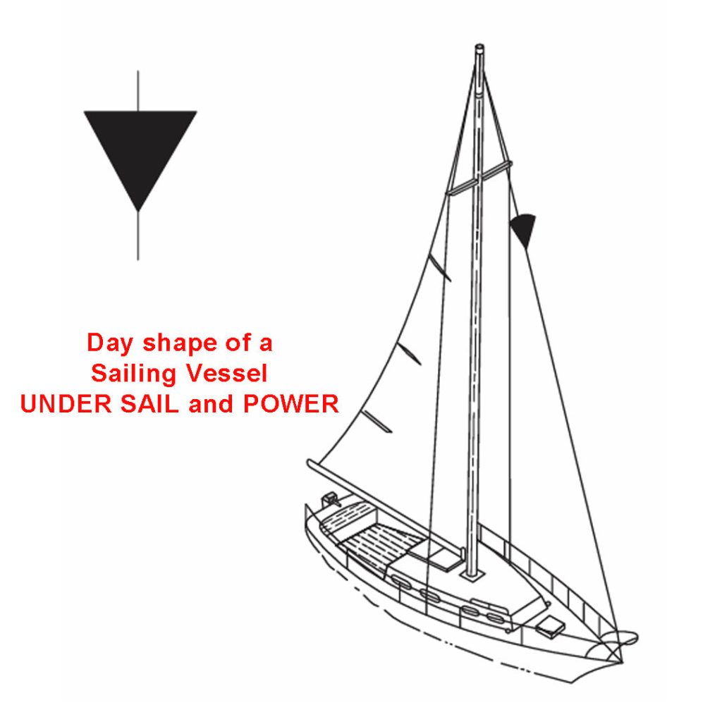 A sailing vessel showing displaying her day shape of a black cone pointing downward.